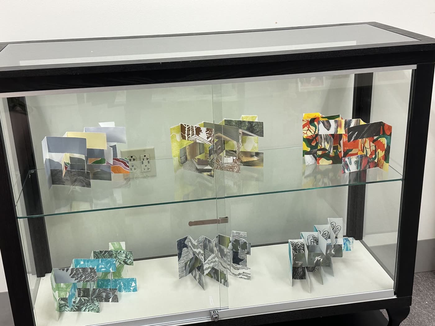 Group show in glass vitrine